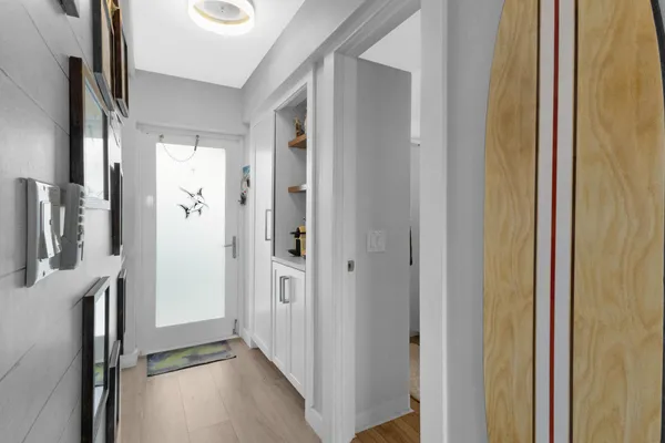 a view of hallway with livingroom