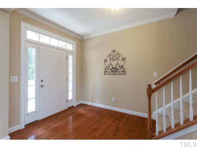 5806 St Agnes Way Raleigh, NC 27612 - Photo 2 of 25 Crown molding throughout the home and beautiful hardwoods throughout much of the first floor living areas. Foyer