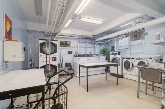 a view of a kitchen and dining room