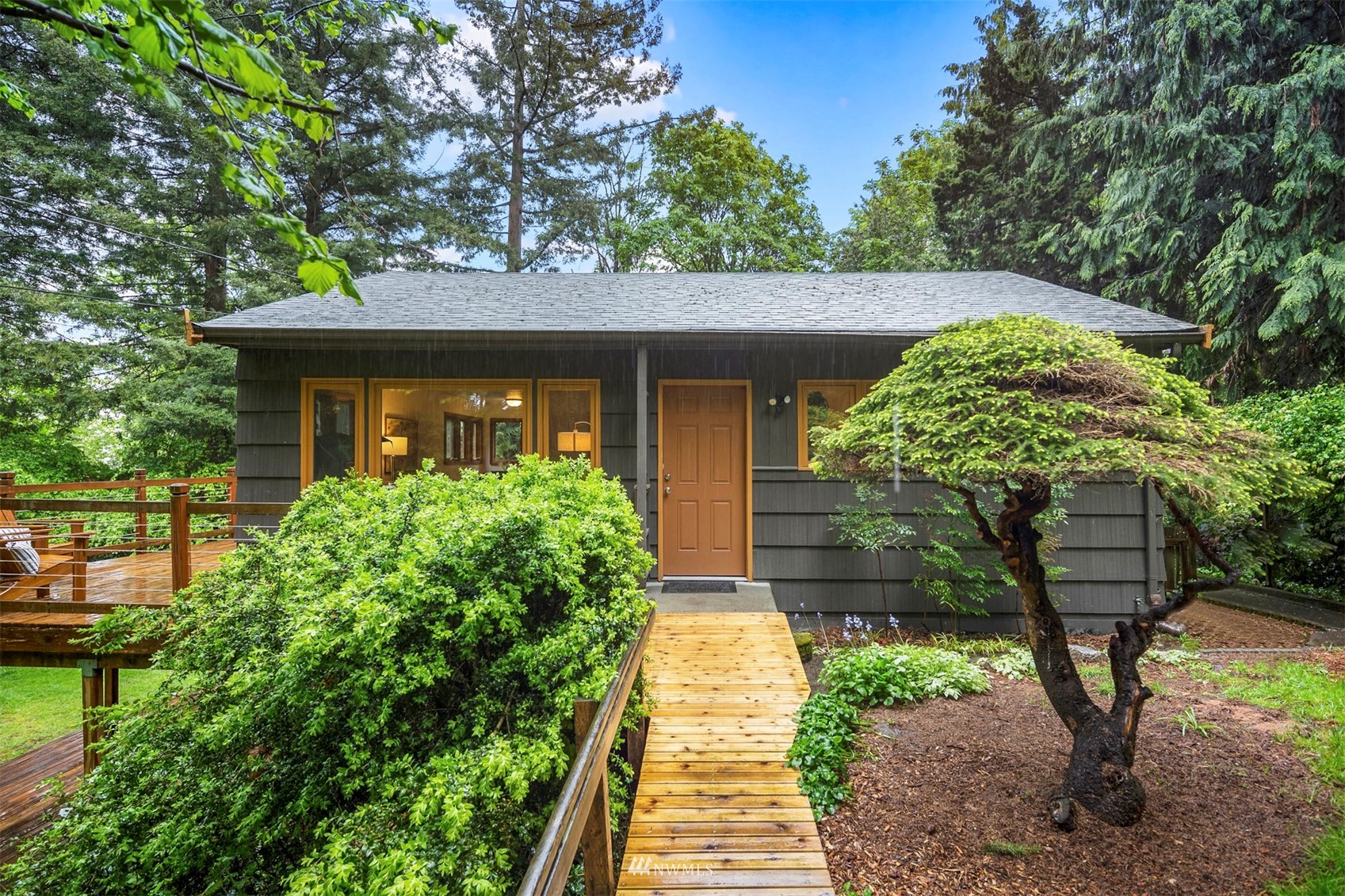 3715 South Webster Street Seattle, WA 98118 - Photo 1 of 39 a front view of a house with a yard