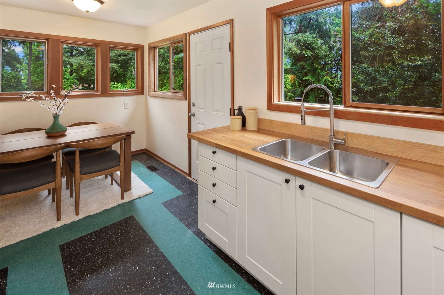 3715 South Webster Street Seattle, WA 98118 - Photo 11 of 39 a kitchen with a sink and large window