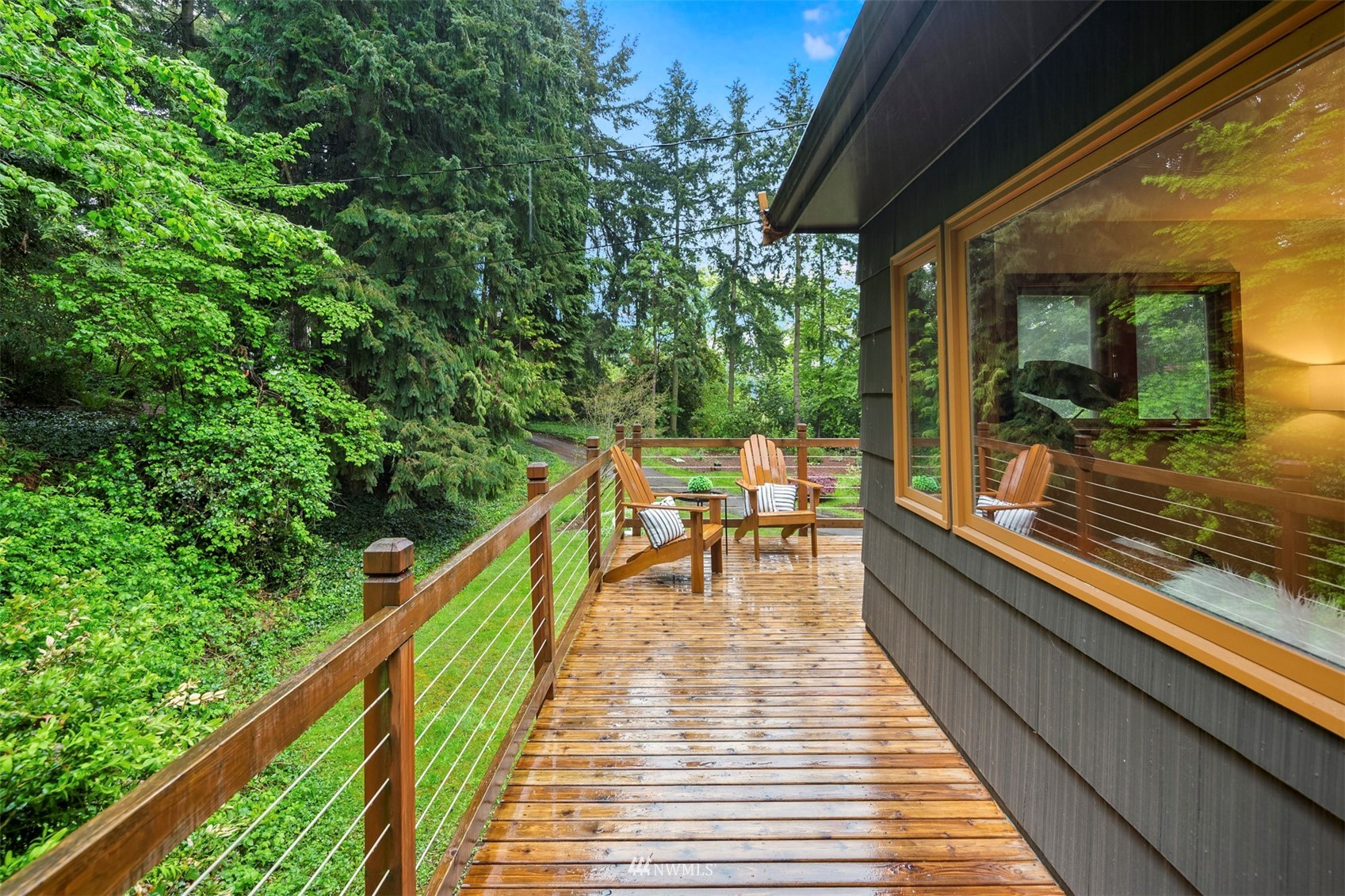 3715 South Webster Street Seattle, WA 98118 - Photo 14 of 39 a view of balcony with wooden floor and outdoor seating
