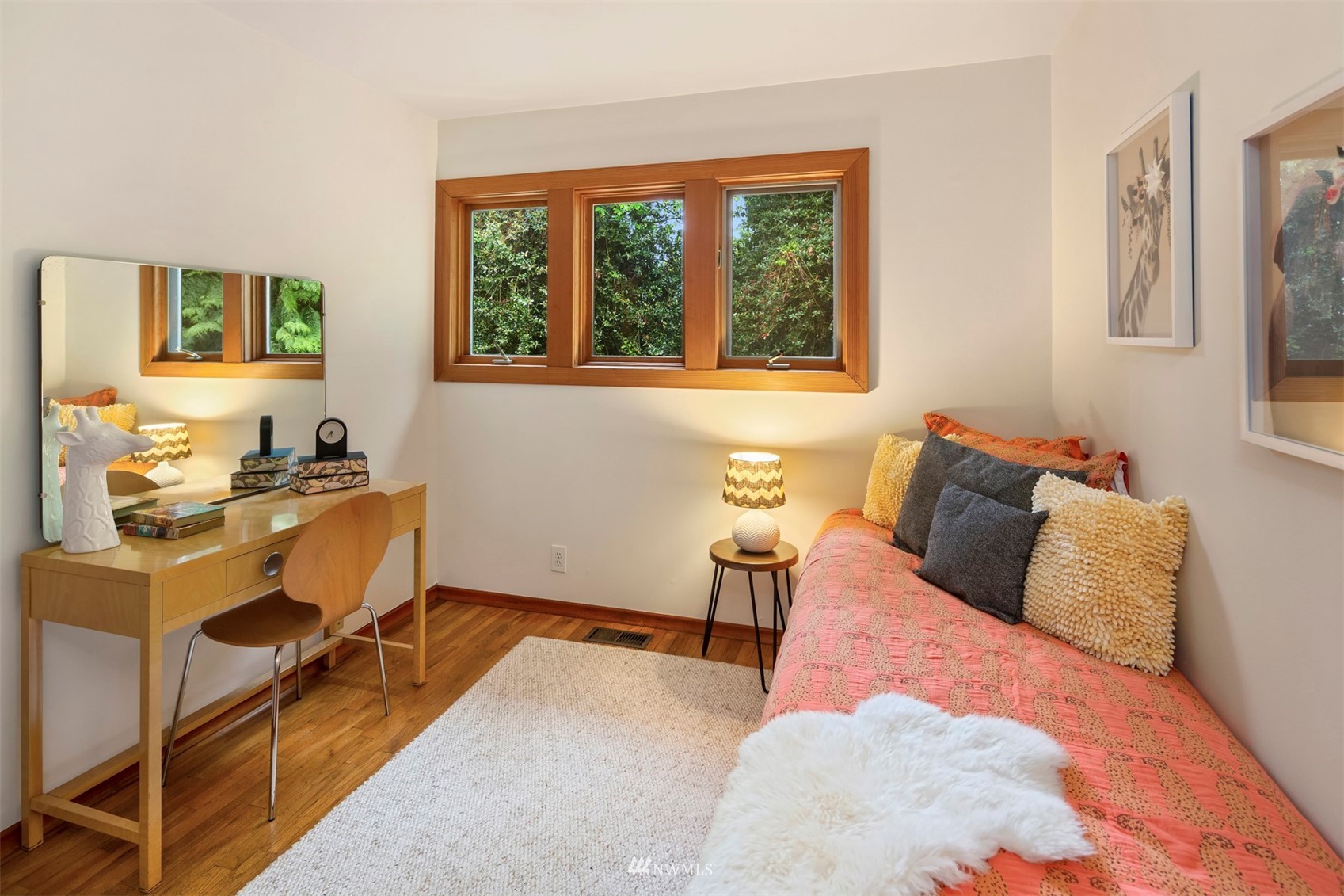 3715 South Webster Street Seattle, WA 98118 - Photo 15 of 39 a bedroom with a bed window and table