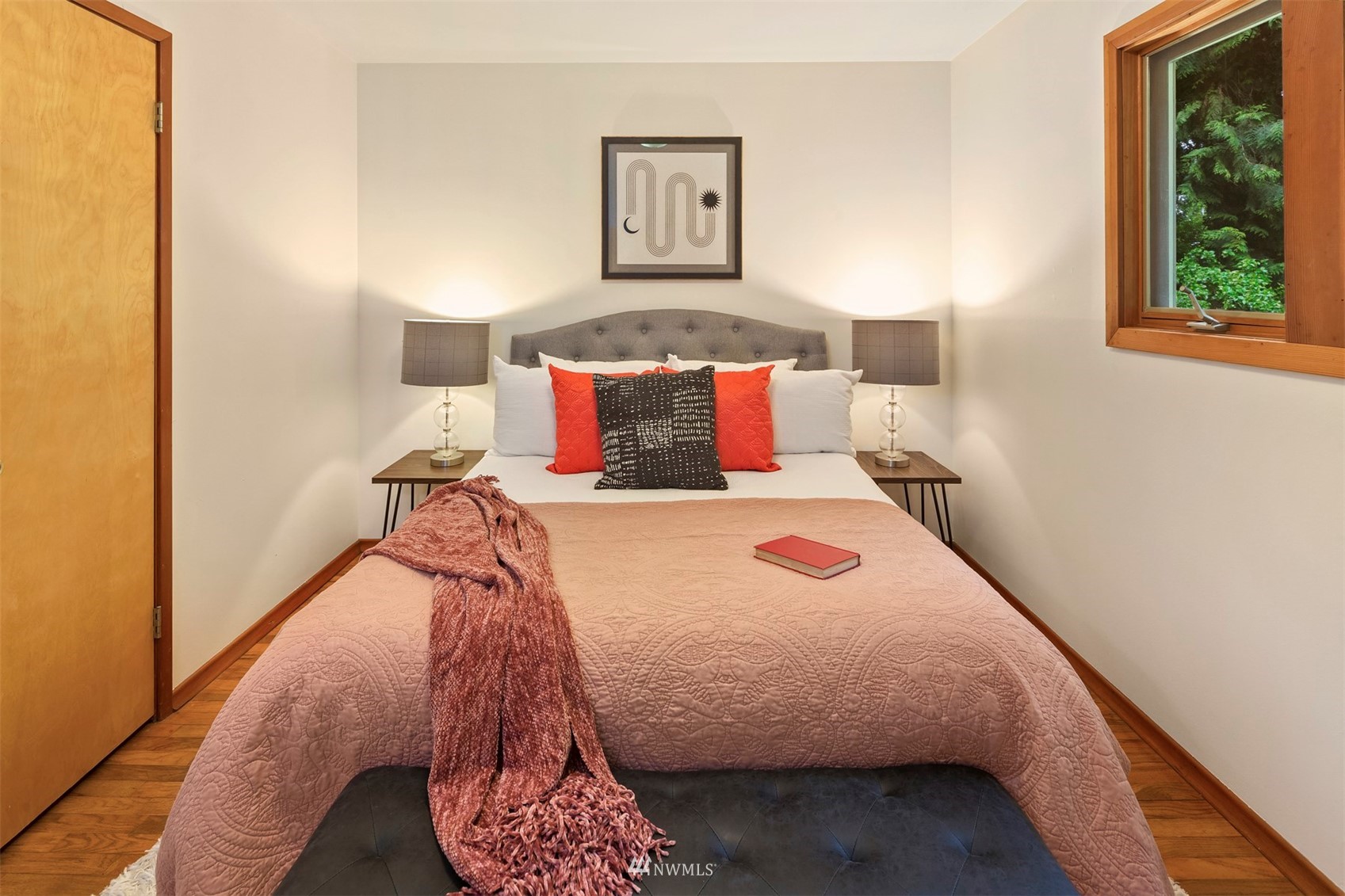 3715 South Webster Street Seattle, WA 98118 - Photo 17 of 39 a bed room with a bed and a painting