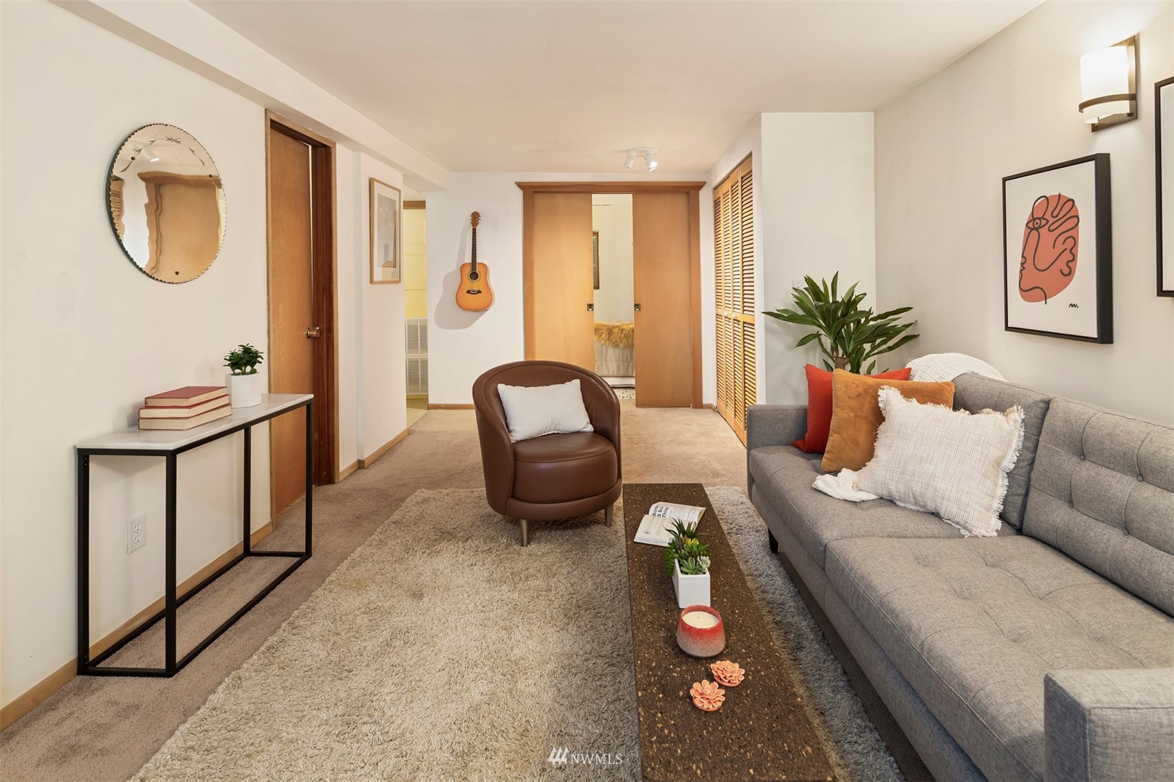 3715 South Webster Street Seattle, WA 98118 - Photo 19 of 39 a living room with furniture and wooden floor