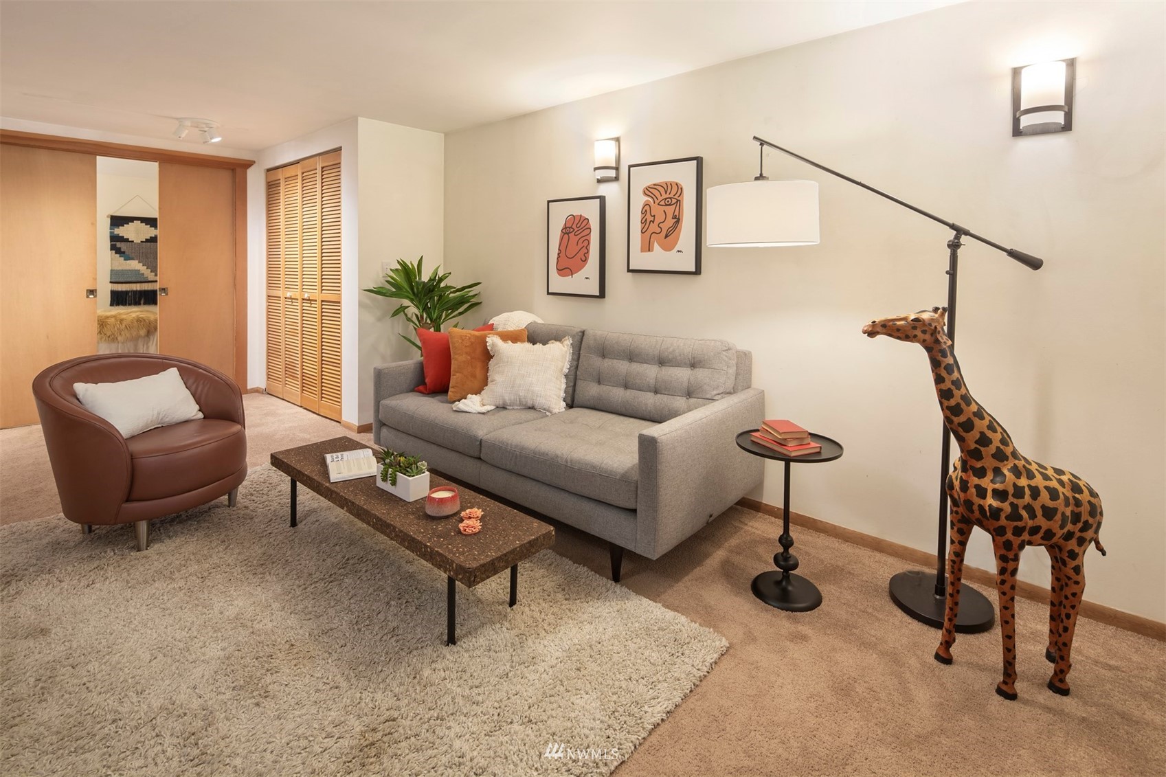 3715 South Webster Street Seattle, WA 98118 - Photo 20 of 39 a living room with furniture and a potted plant