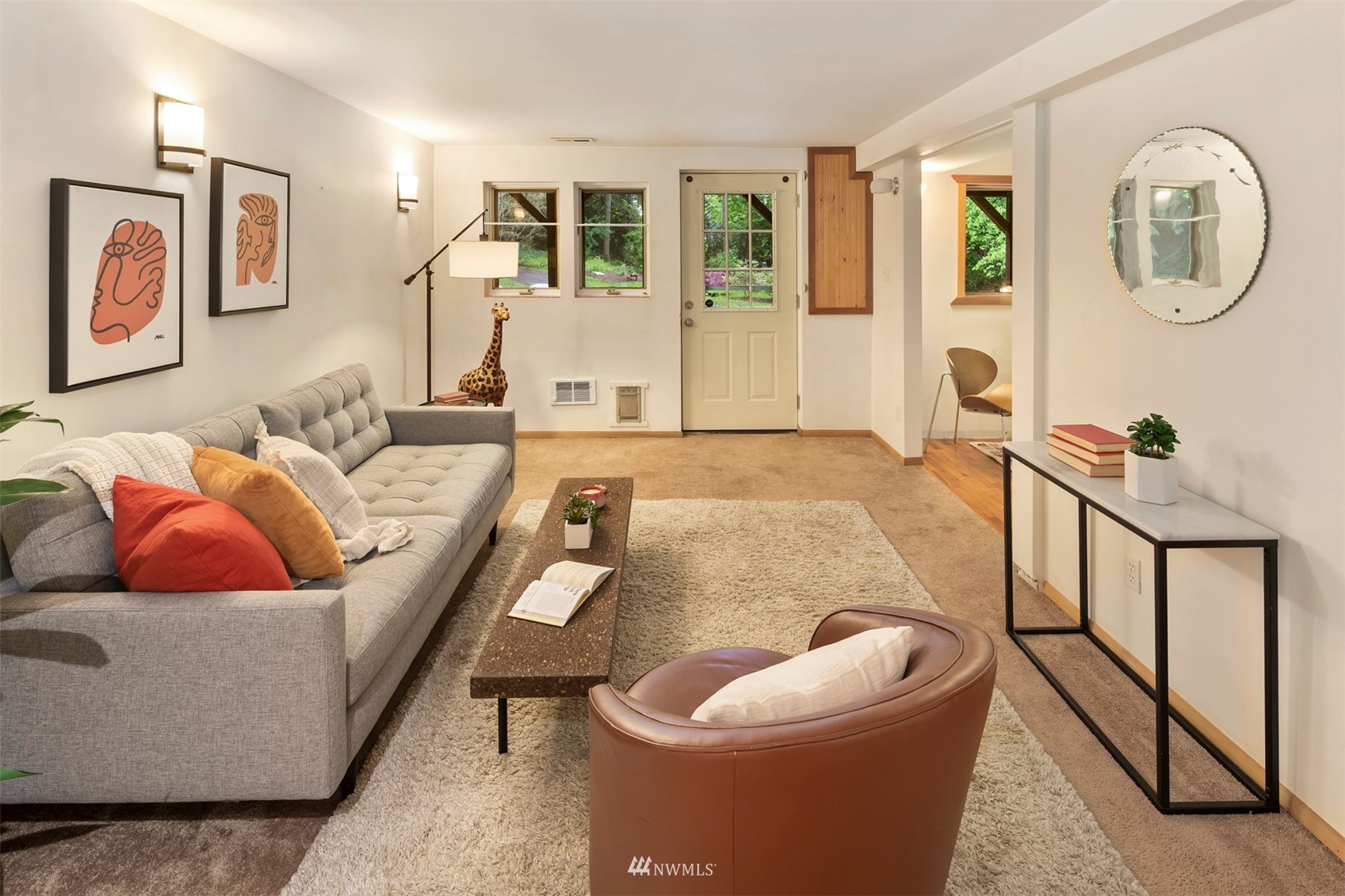 3715 South Webster Street Seattle, WA 98118 - Photo 21 of 39 a living room with furniture and a large window