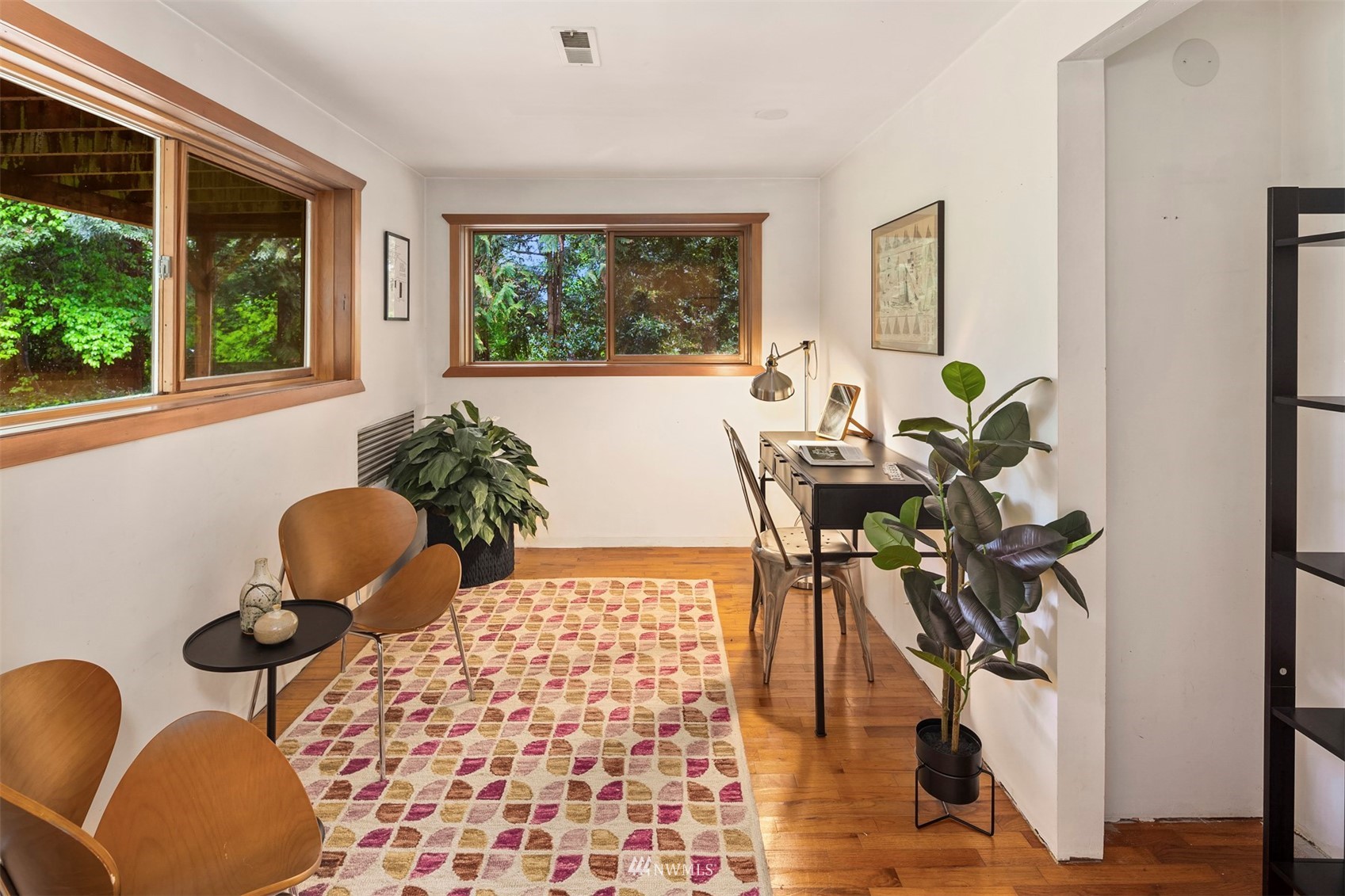 3715 South Webster Street Seattle, WA 98118 - Photo 22 of 39 a dining room with furniture and a window