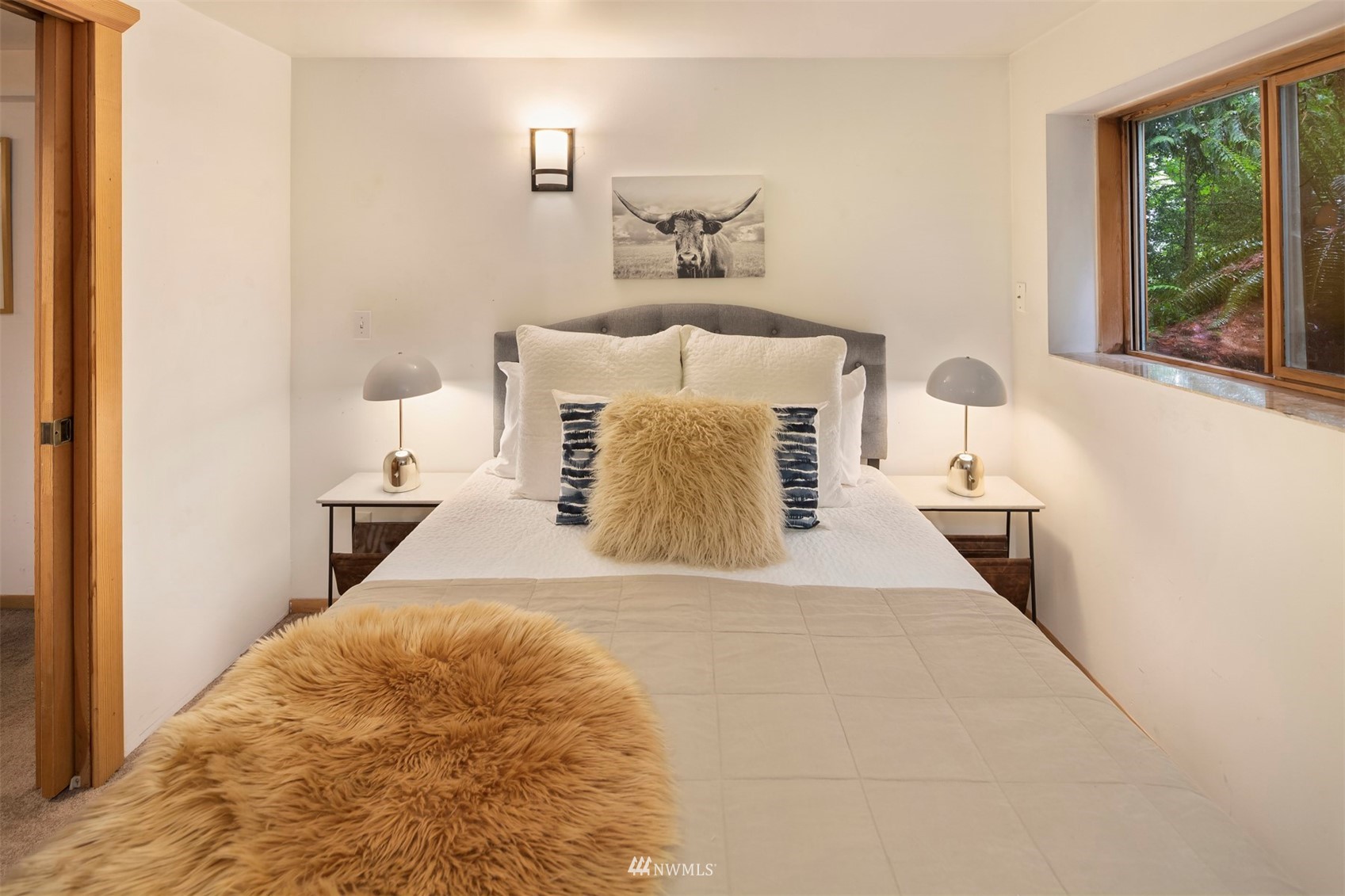 3715 South Webster Street Seattle, WA 98118 - Photo 27 of 39 a bedroom with a bed and a window