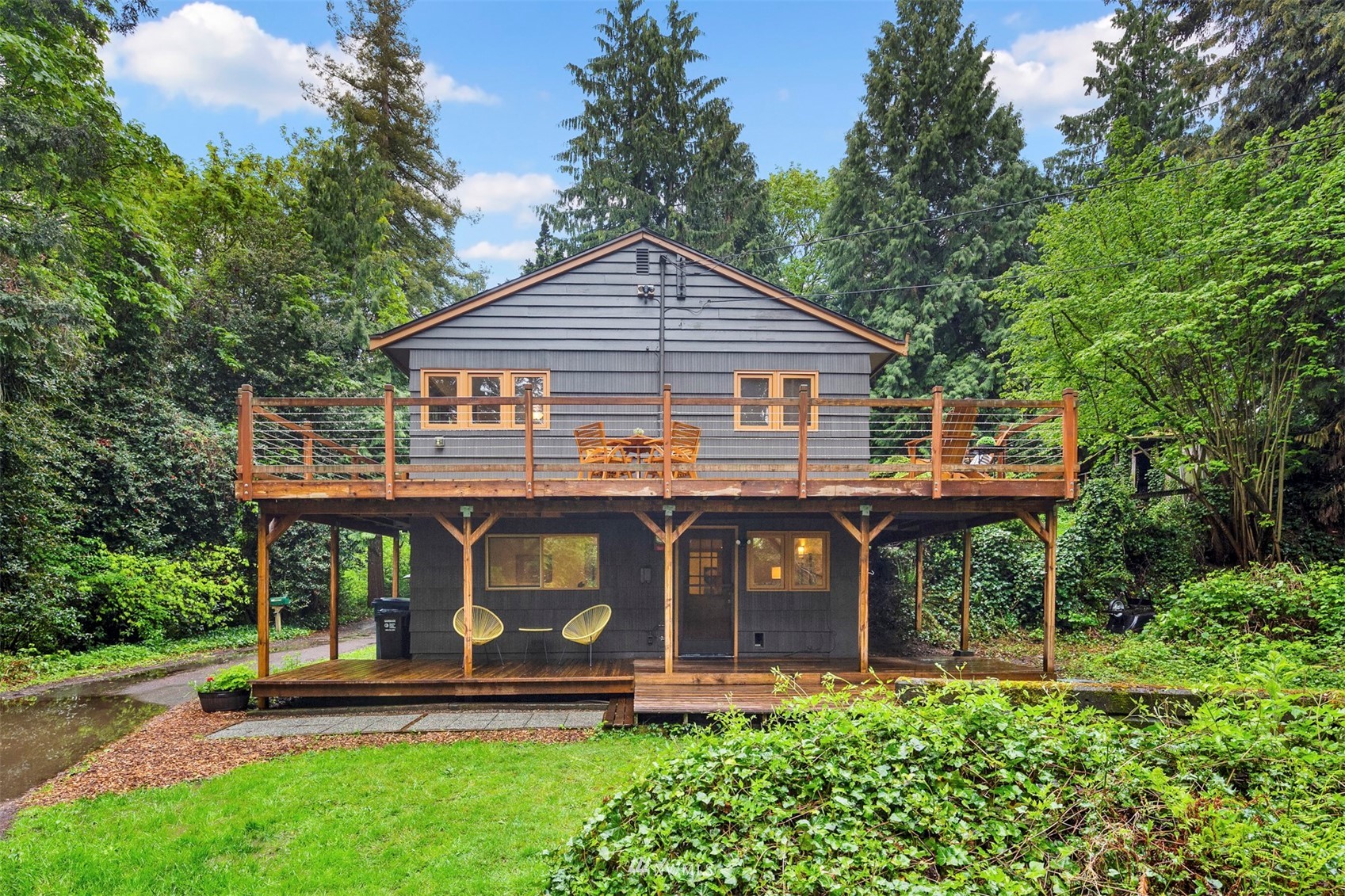 3715 South Webster Street Seattle, WA 98118 - Photo 30 of 39 a front view of house with yard and trees around