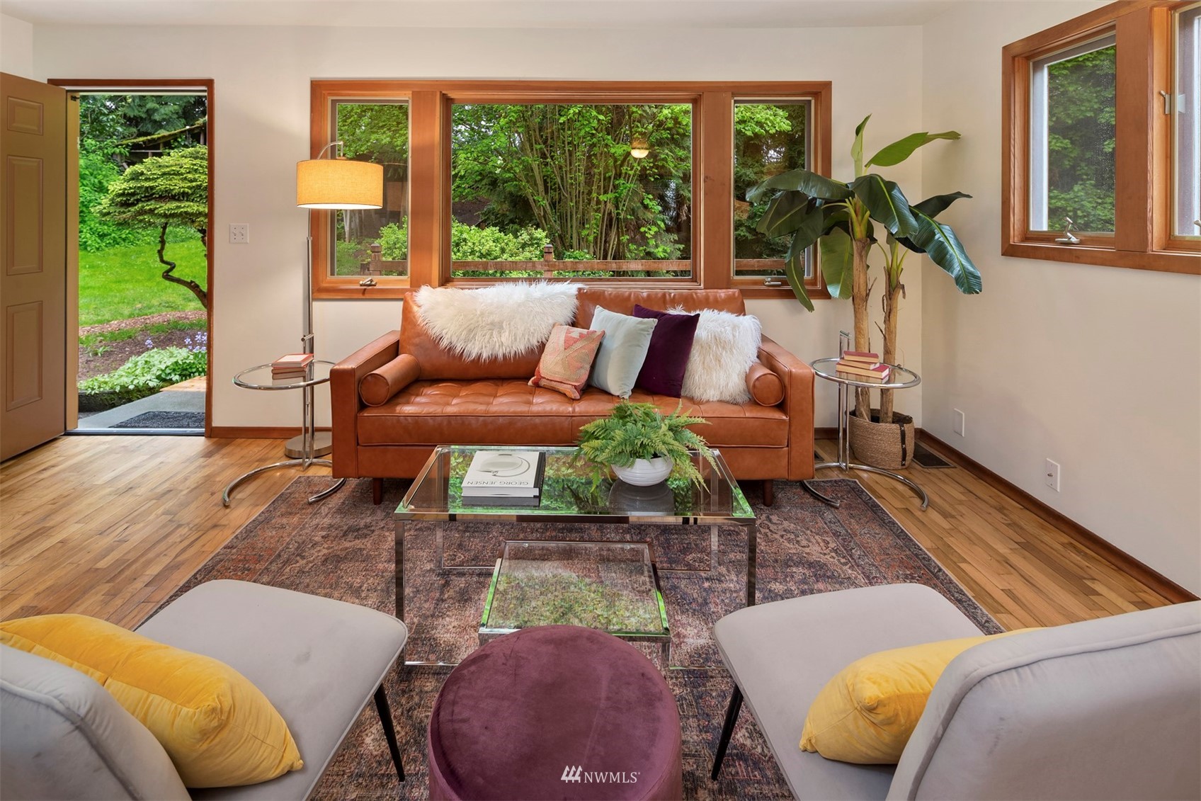 3715 South Webster Street Seattle, WA 98118 - Photo 3 of 39 a living room with furniture and a wooden floor