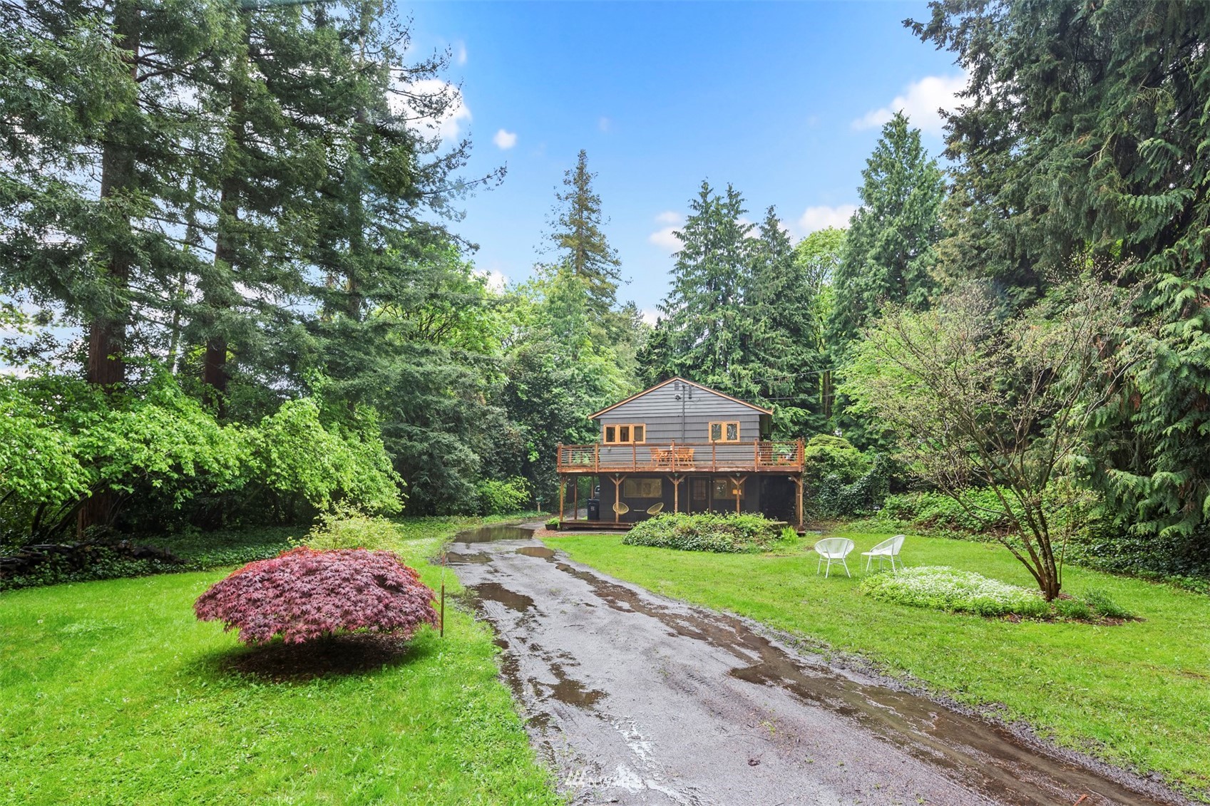 3715 South Webster Street Seattle, WA 98118 - Photo 33 of 39 a front view of a house with garden