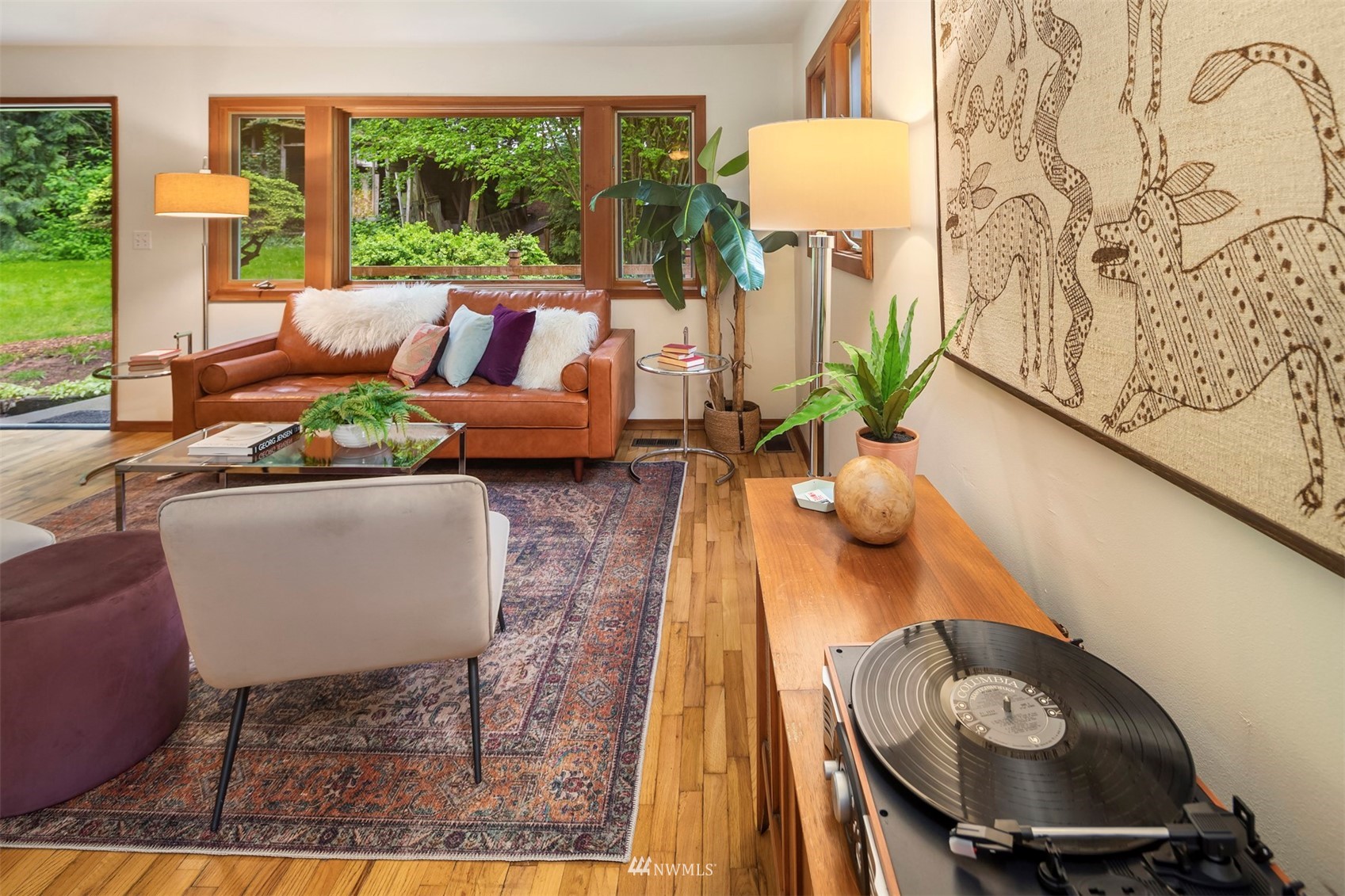 3715 South Webster Street Seattle, WA 98118 - Photo 7 of 39 a living room with furniture and a table