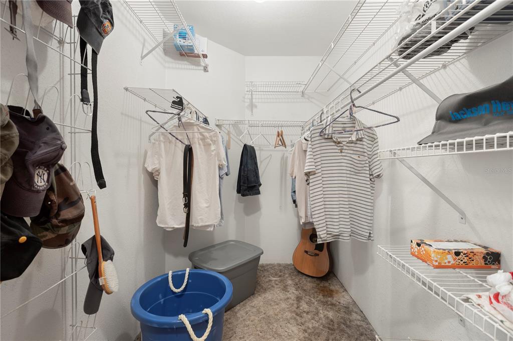 18321 McMullen Road Spring Hill, FL 34610 - Photo 45 of 56 a bathroom with a sink and mirror