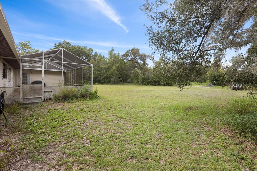 18321 McMullen Road Spring Hill, FL 34610 - Photo 52 of 56 a view of a backyard