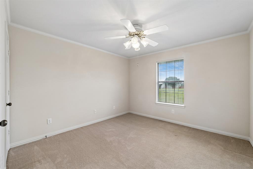 1175 Bloom Street Lucas, TX 75002 - Photo 21 of 36 an empty room with a window and a fan