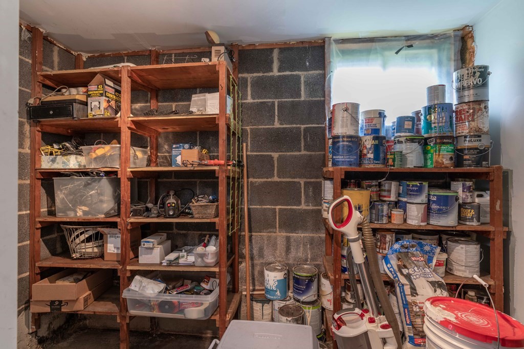 25 Amherst Road Pelham, MA 01002 - Photo 17 of 22 a view of store room with racks