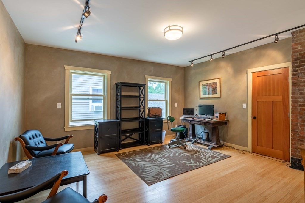 25 Amherst Road Pelham, MA 01002 - Photo 19 of 22 a view of a workspace with furniture and a window