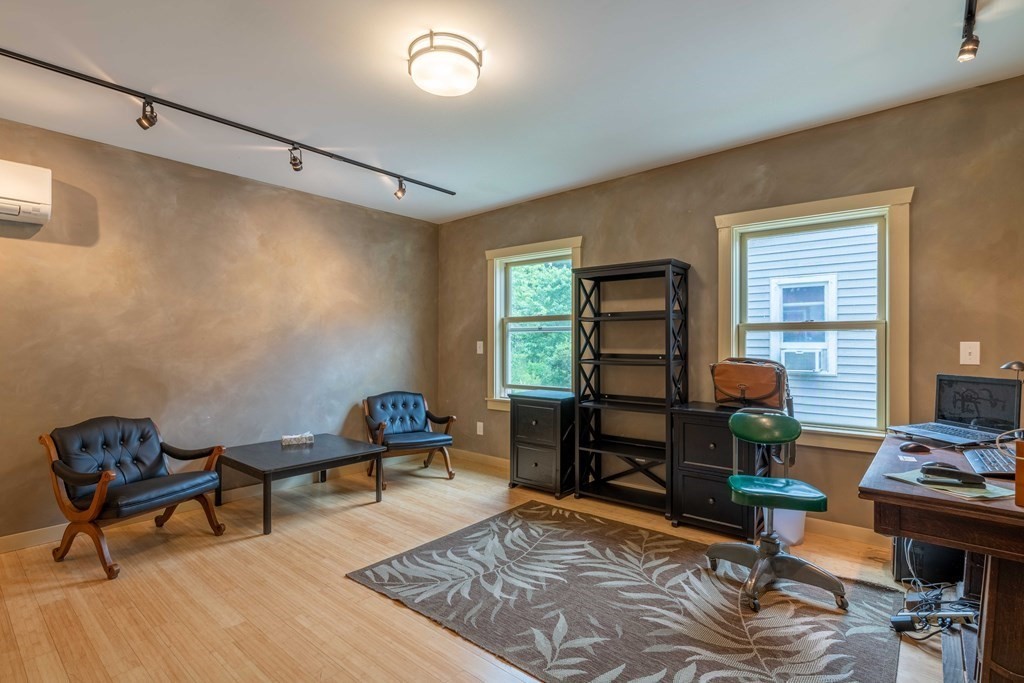25 Amherst Road Pelham, MA 01002 - Photo 20 of 22 a living room with furniture and a window
