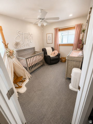 303 North Main Street Grace, ID 83241 - Photo 14 of 22 Carpeted room featuring a ceiling fan with integrated lighting, a window with horizontal blinds, wood trim, and recessed lighting