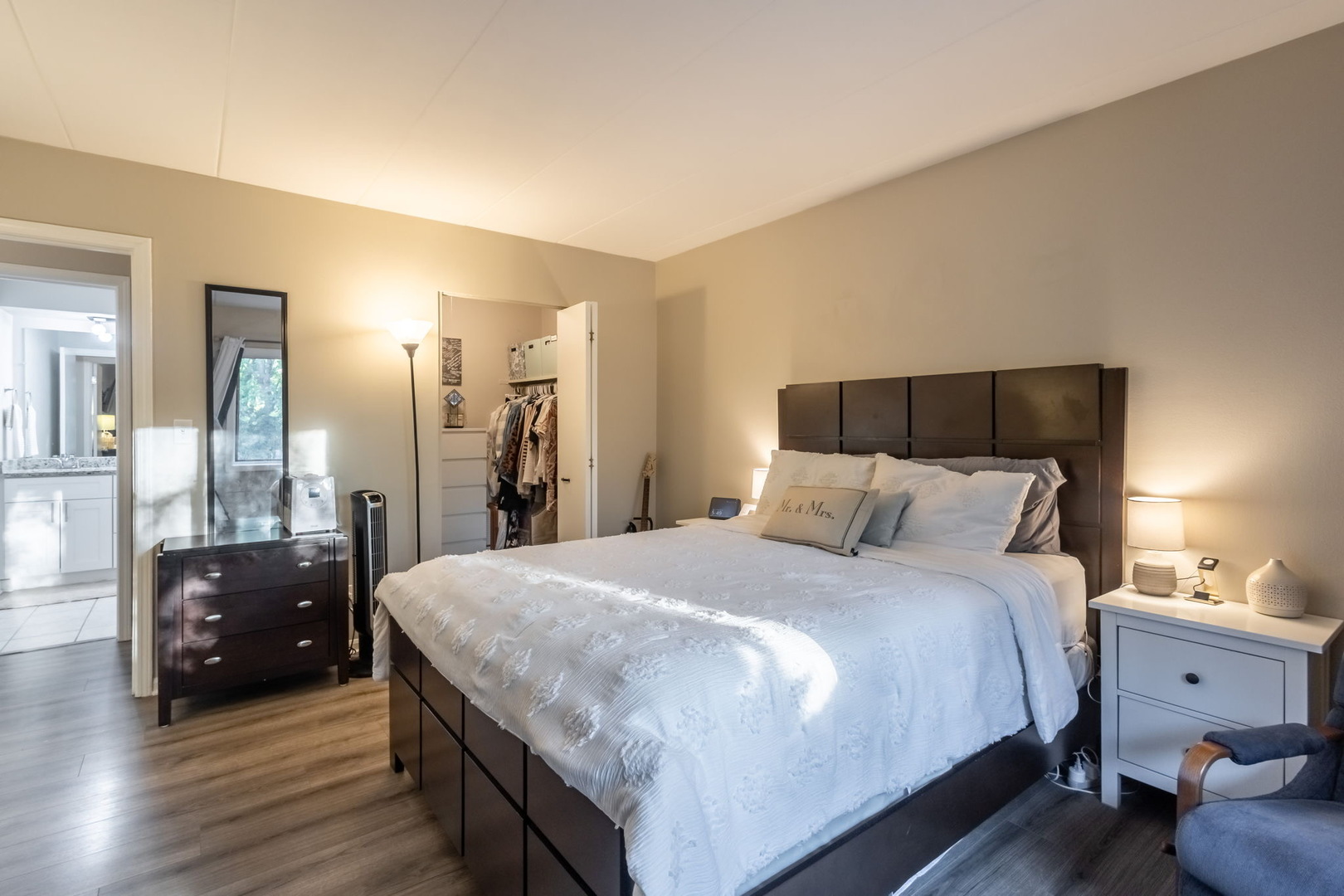 154 East Bailey Road, Unit F Naperville, IL 60565 - Photo 15 of 25 a spacious bedroom with a bed and a view of bathroom