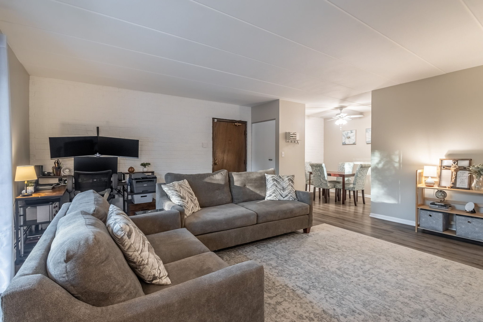 154 East Bailey Road, Unit F Naperville, IL 60565 - Photo 10 of 25 a living room with furniture and a couch