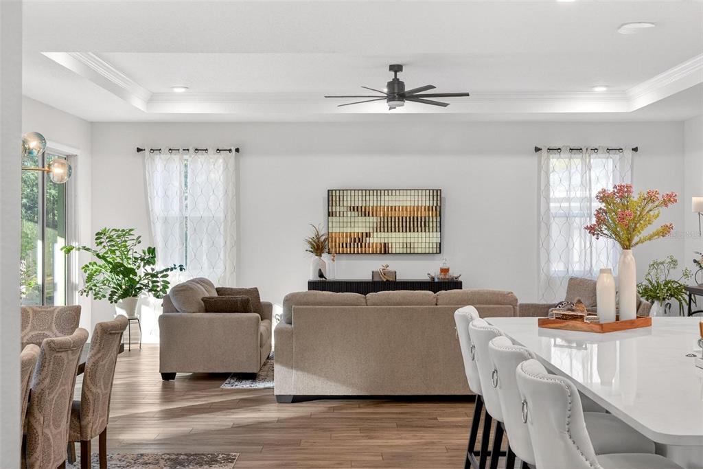 9746 Southwest 108th Terrace Road Ocala, FL 34481 - Photo 16 of 99 a living room with furniture and a large window