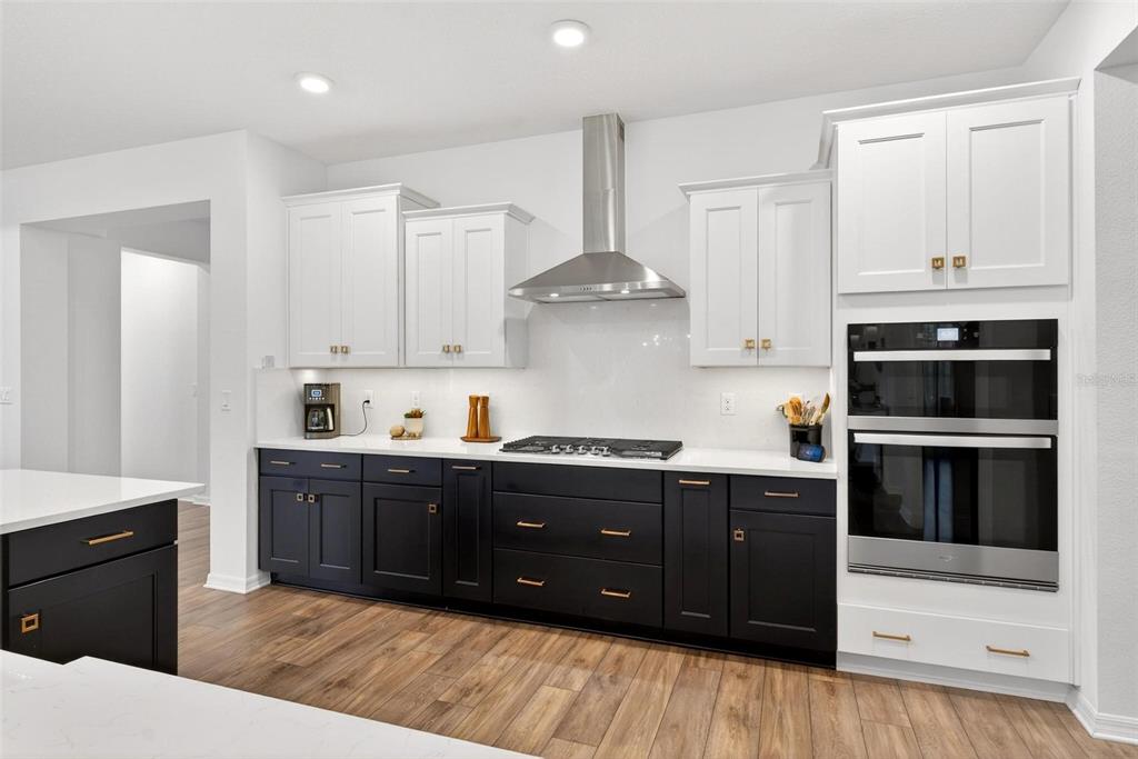 9746 Southwest 108th Terrace Road Ocala, FL 34481 - Photo 26 of 99 a kitchen with stainless steel appliances granite countertop a stove and a sink