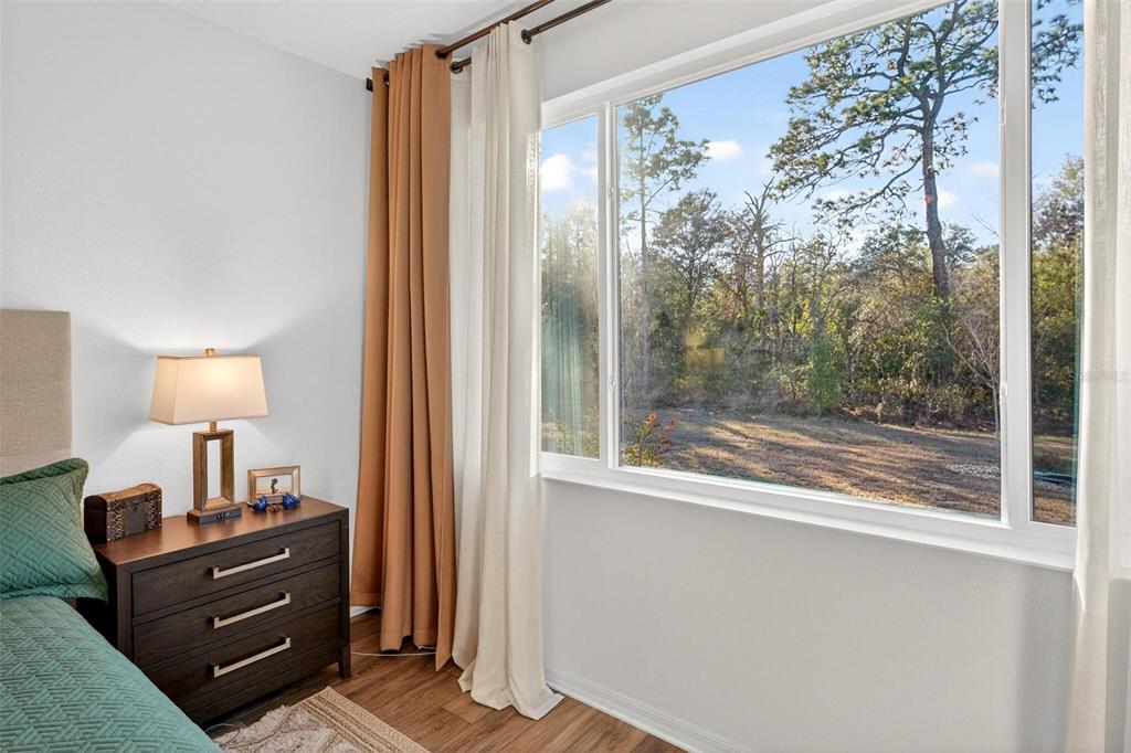 9746 Southwest 108th Terrace Road Ocala, FL 34481 - Photo 48 of 99 a room with a bed and a window