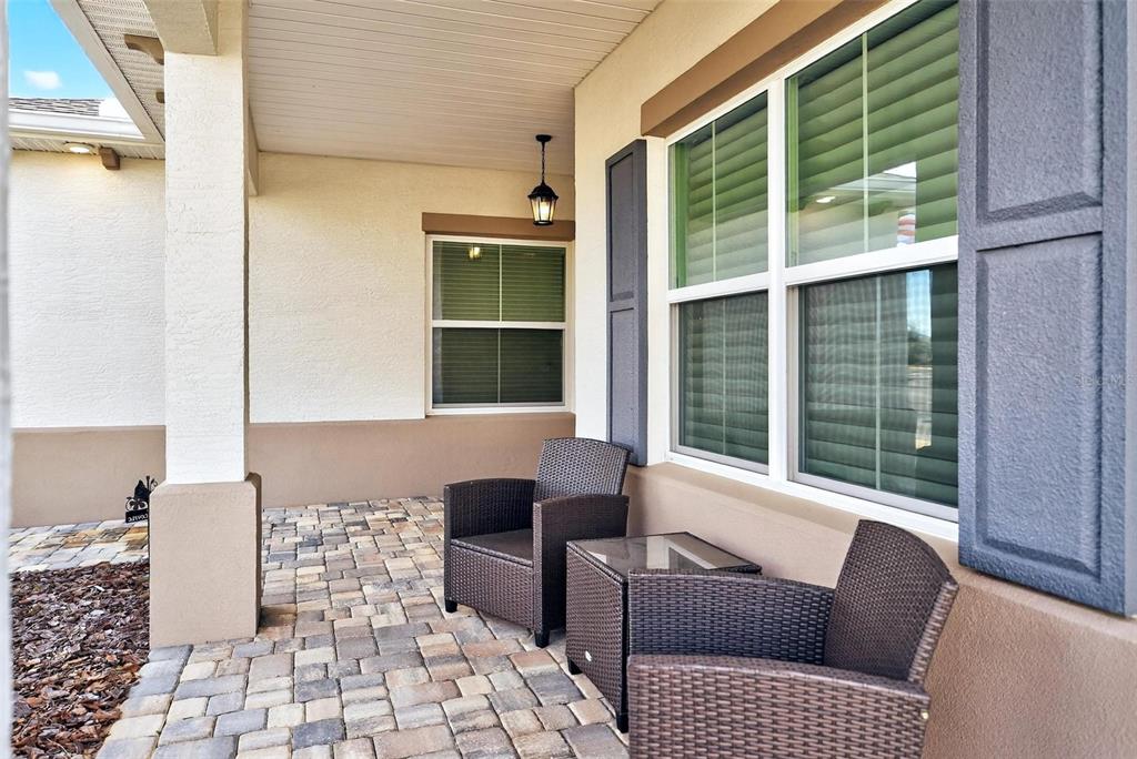 9746 Southwest 108th Terrace Road Ocala, FL 34481 - Photo 6 of 99 a living room with furniture and a window with outer view
