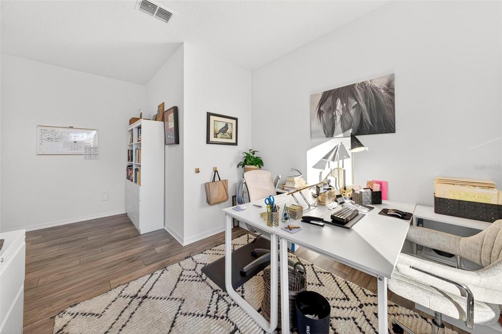 9746 Southwest 108th Terrace Road Ocala, FL 34481 - Photo 75 of 99 a view of a workspace with furniture