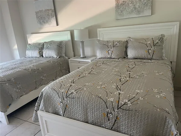 a room with furniture and flat screen tv