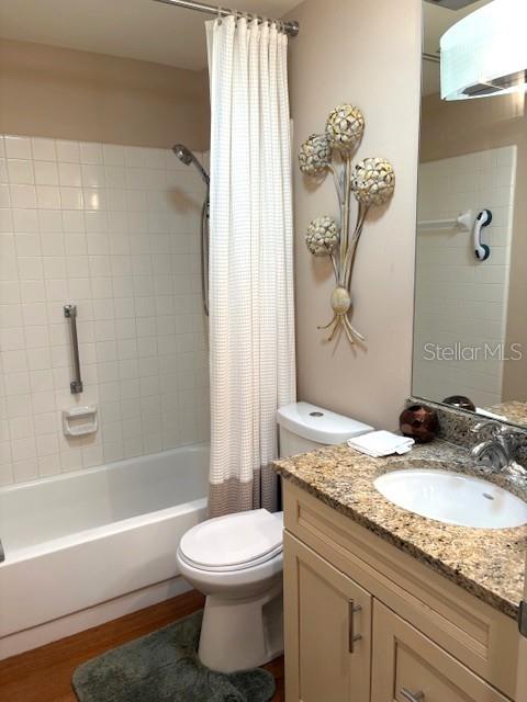 404 Feltham Trail, Unit B Sun City Center, FL 33573 - Photo 29 of 59 a bathroom with a granite countertop sink toilet and shower