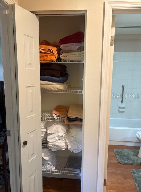 404 Feltham Trail, Unit B Sun City Center, FL 33573 - Photo 37 of 59 a bathroom with a sink and a mirror