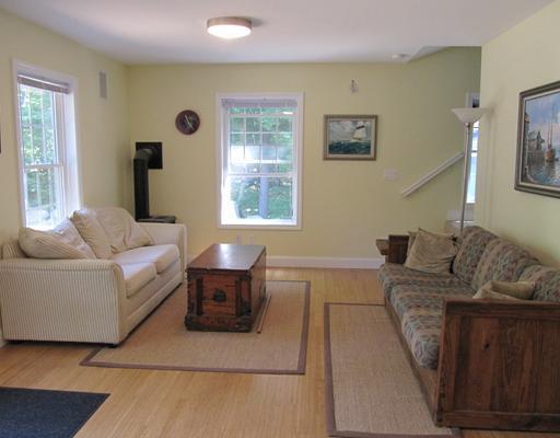 1121 South Beach Road Standish, ME 04084 - Photo 11 of 25 Living Room. Lots of light and many...