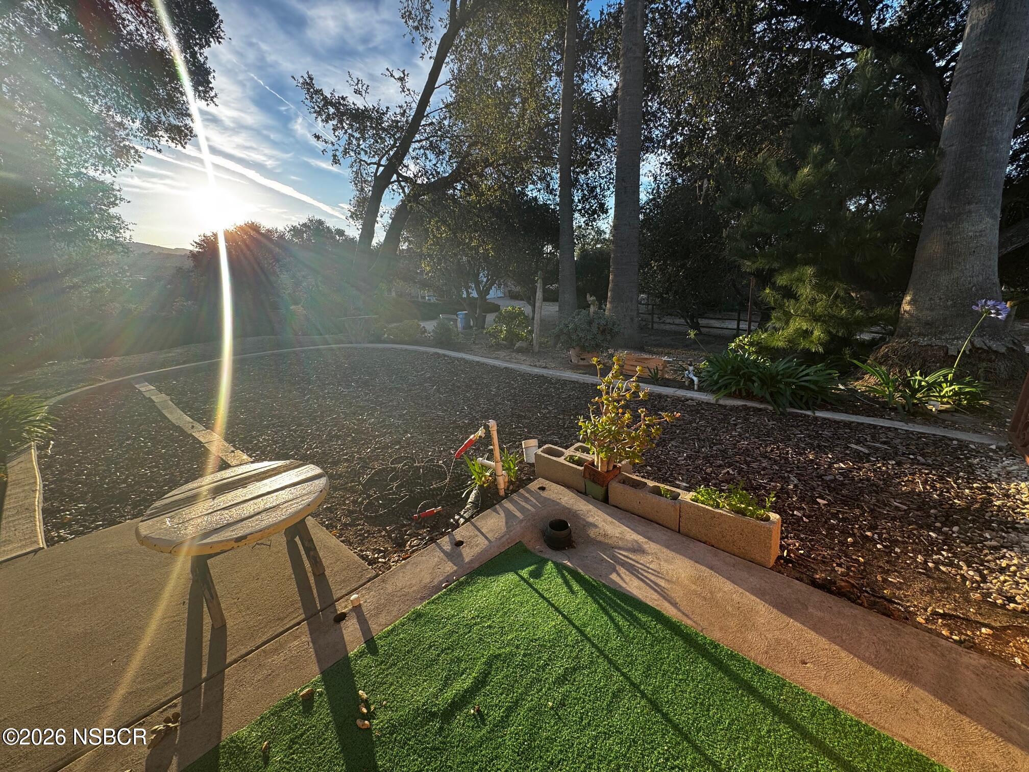 460 Rim Rock Road Nipomo, CA 93444 - Photo 7 of 7 a view of a backyard with sitting area