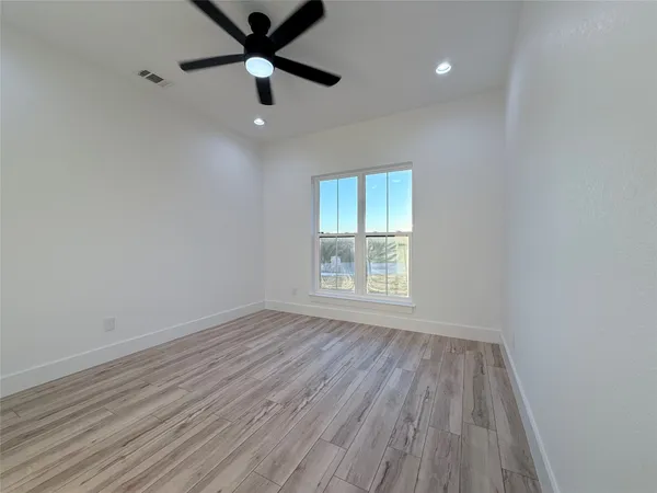 a view of an empty walk in closet