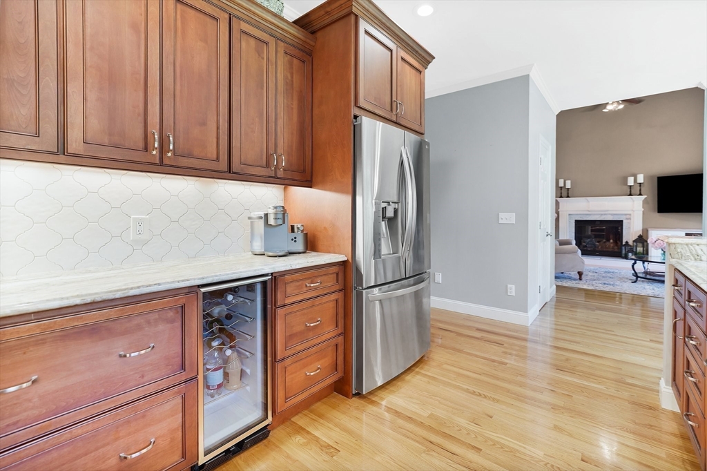 24 Two Ponds Road Belchertown, MA 01007 - Photo 13 of 41 a kitchen with stainless steel appliances granite countertop a refrigerator and a stove top oven