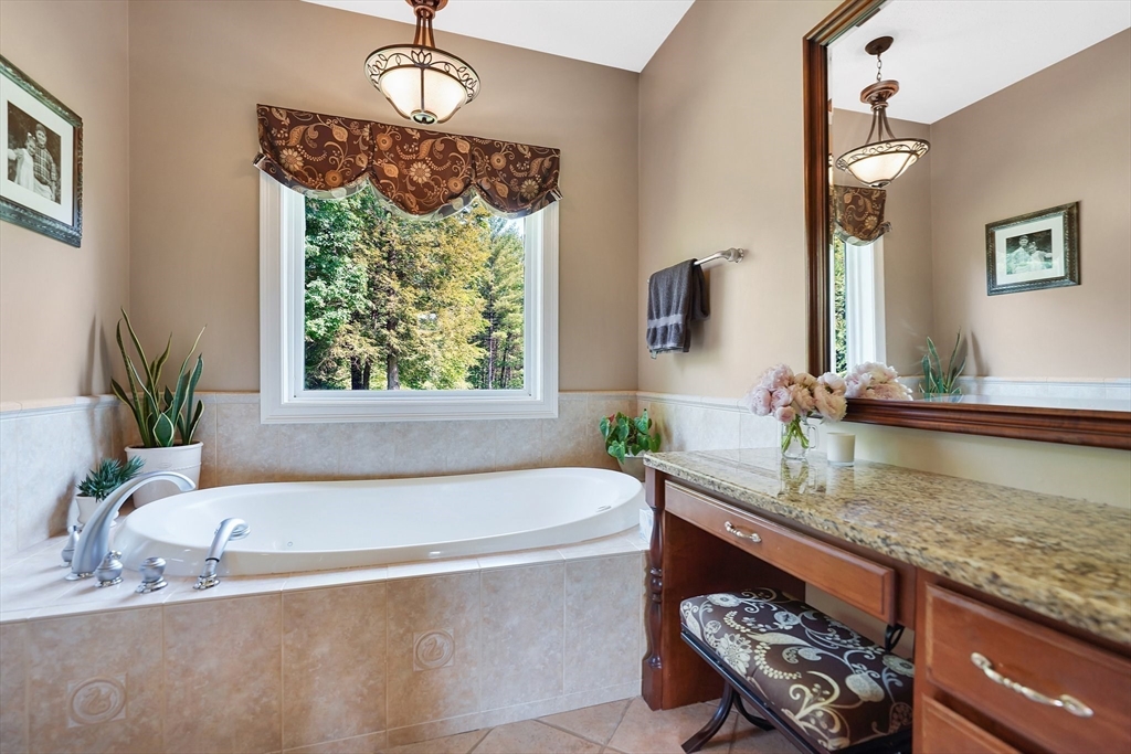 24 Two Ponds Road Belchertown, MA 01007 - Photo 21 of 41 a bath tub sitting next to a window