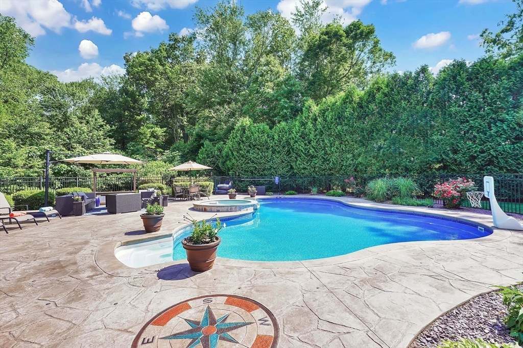 24 Two Ponds Road Belchertown, MA 01007 - Photo 3 of 41 a view of a swimming pool with a patio