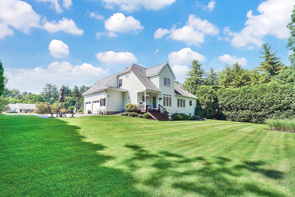 24 Two Ponds Road Belchertown, MA 01007 - Photo 38 of 41 a front view of a house with garden