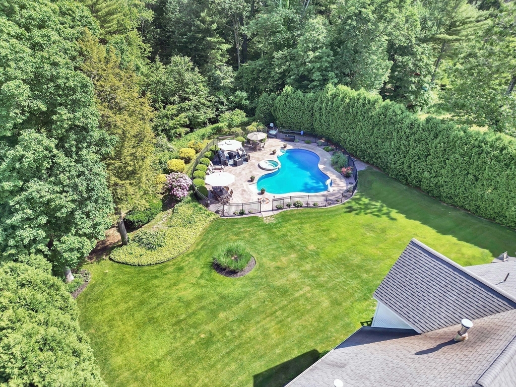 24 Two Ponds Road Belchertown, MA 01007 - Photo 39 of 41 a view of a table and chairs in backyard