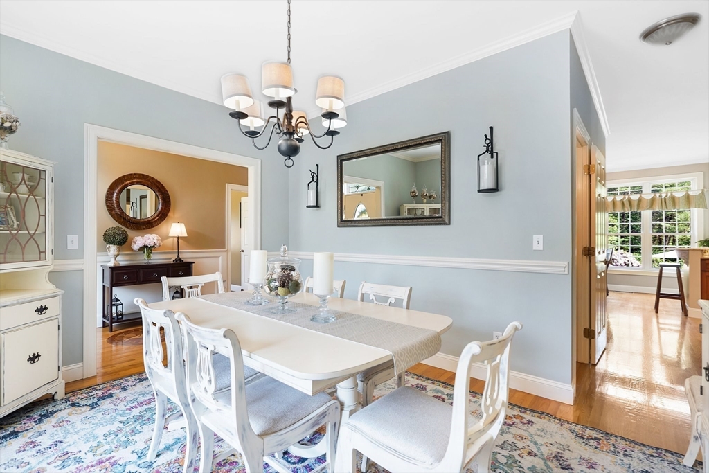 24 Two Ponds Road Belchertown, MA 01007 - Photo 8 of 41 a view of a dining room with furniture window and wooden floor