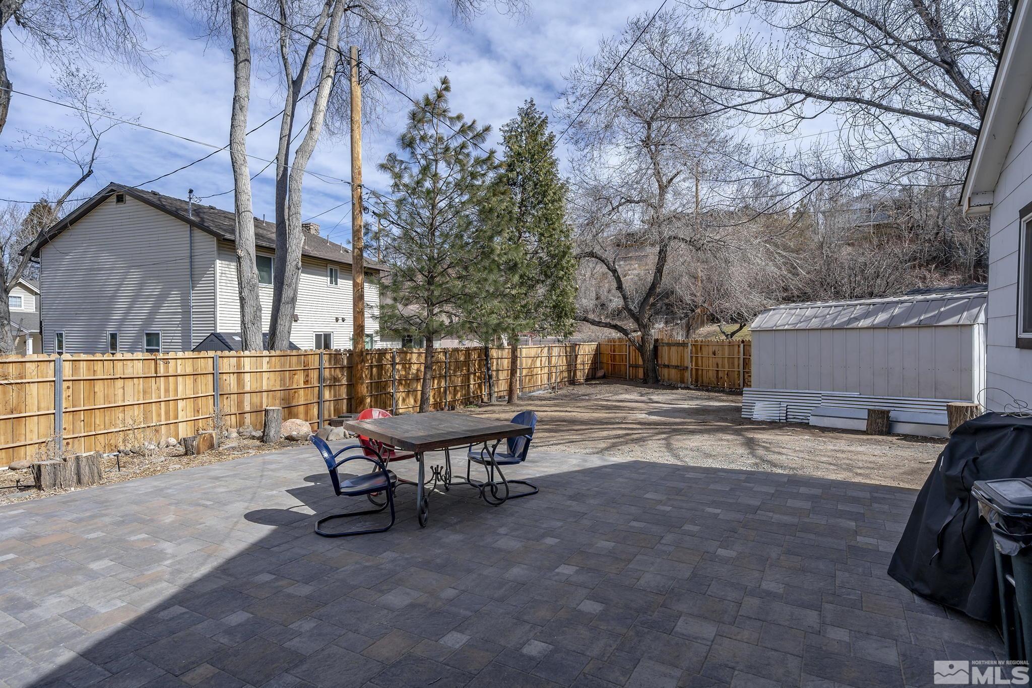 20 Kaye Way Reno, NV 89509 - Photo 14 of 17 a view of a house with backyard and a tree