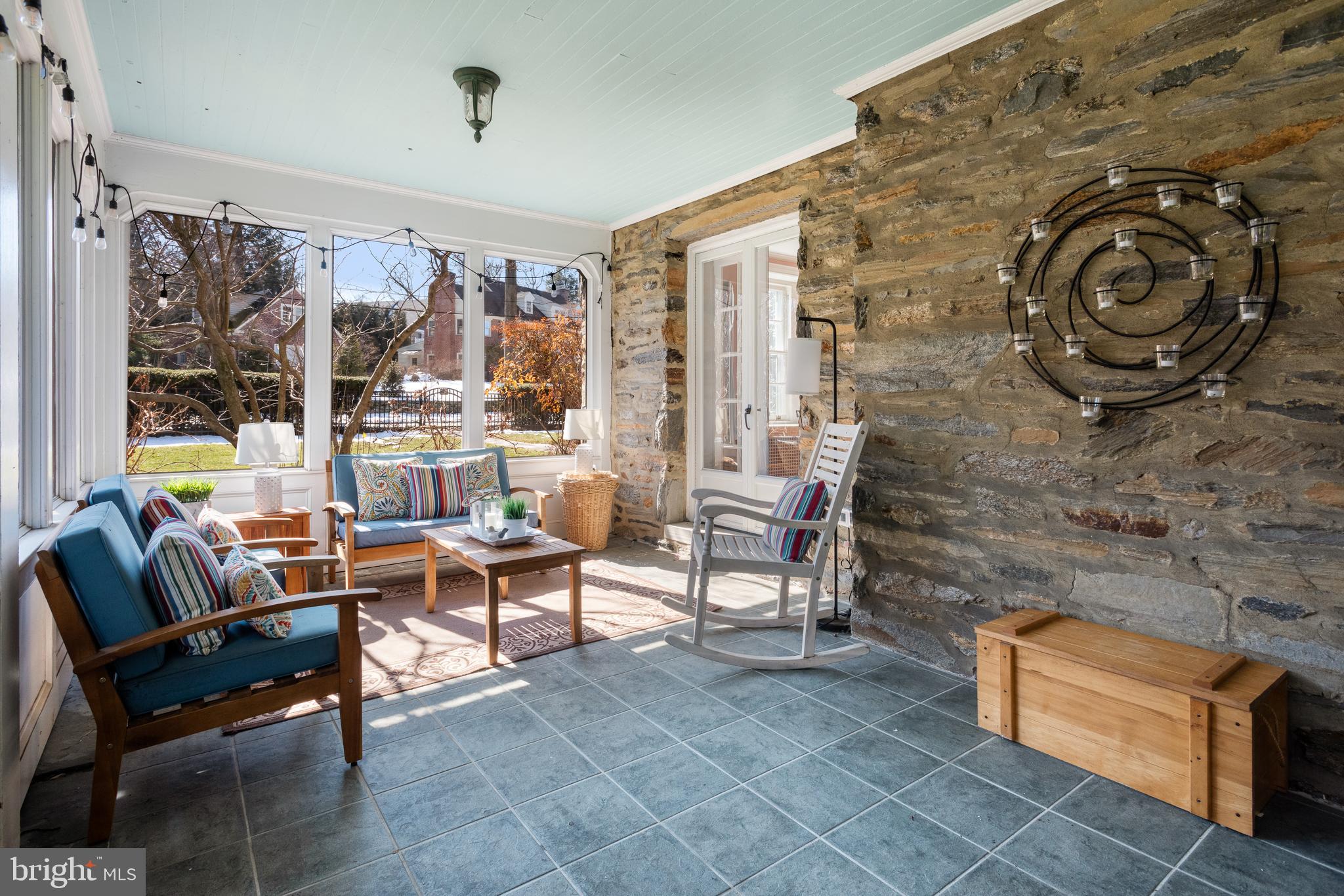 621 Pembroke Road Bryn Mawr, PA 19010 - Photo 12 of 58 Striking accent wall adorns the enclosed porch