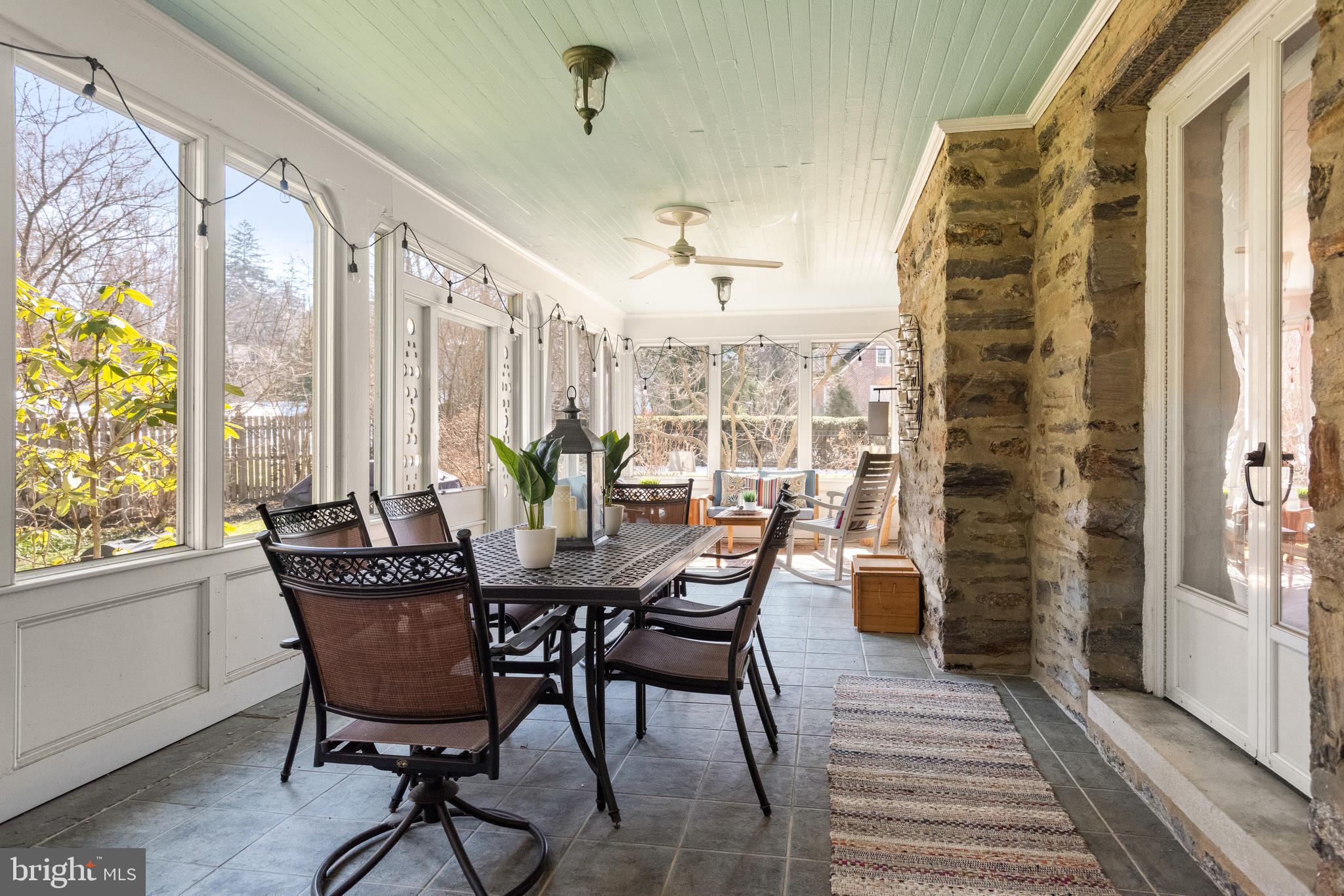 621 Pembroke Road Bryn Mawr, PA 19010 - Photo 13 of 58 Relaxed seating, dining tables and potted plants