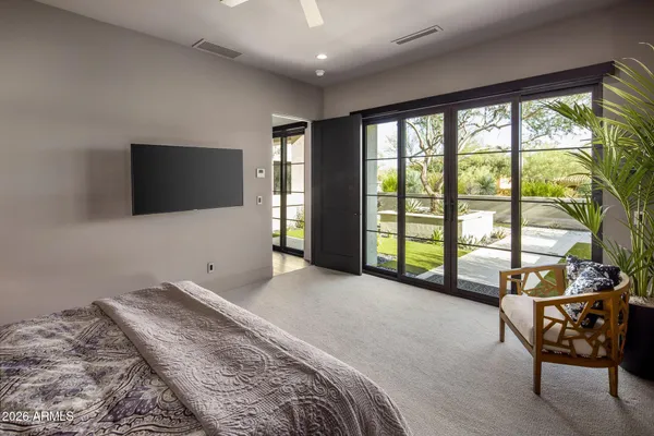 a media room with lots of chairs and a projector screen