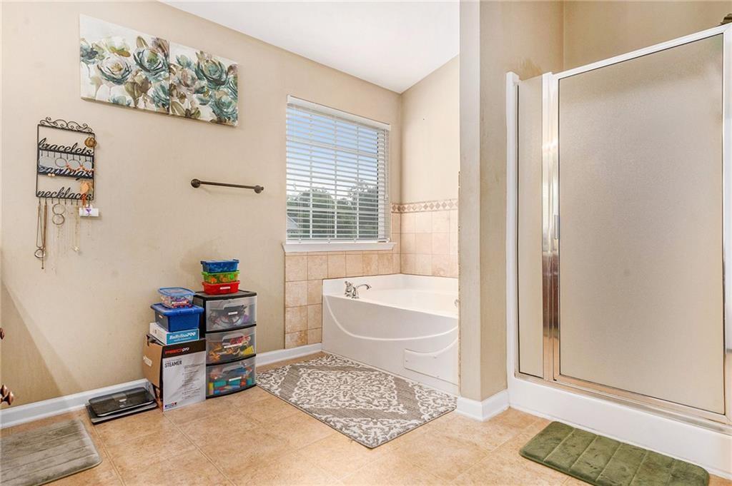 Undisclosed Address Hampton, GA 30228 - Photo 26 of 45 a living room with furniture and a window