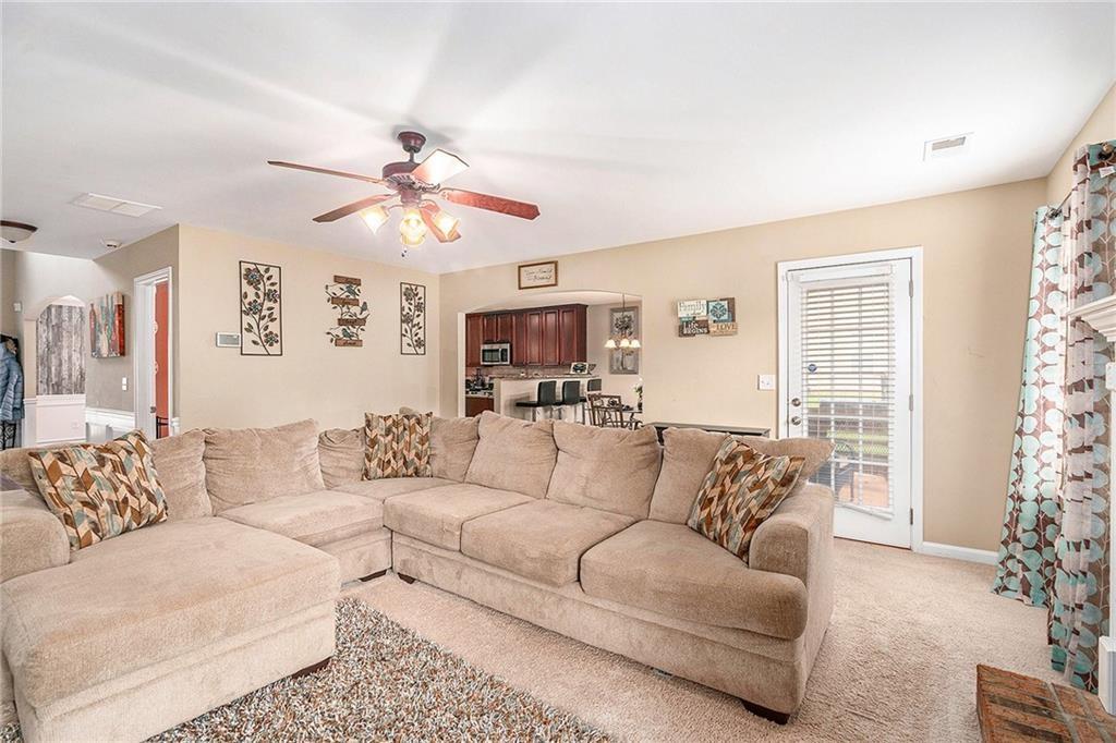 Undisclosed Address Hampton, GA 30228 - Photo 8 of 45 a living room with furniture and a large window