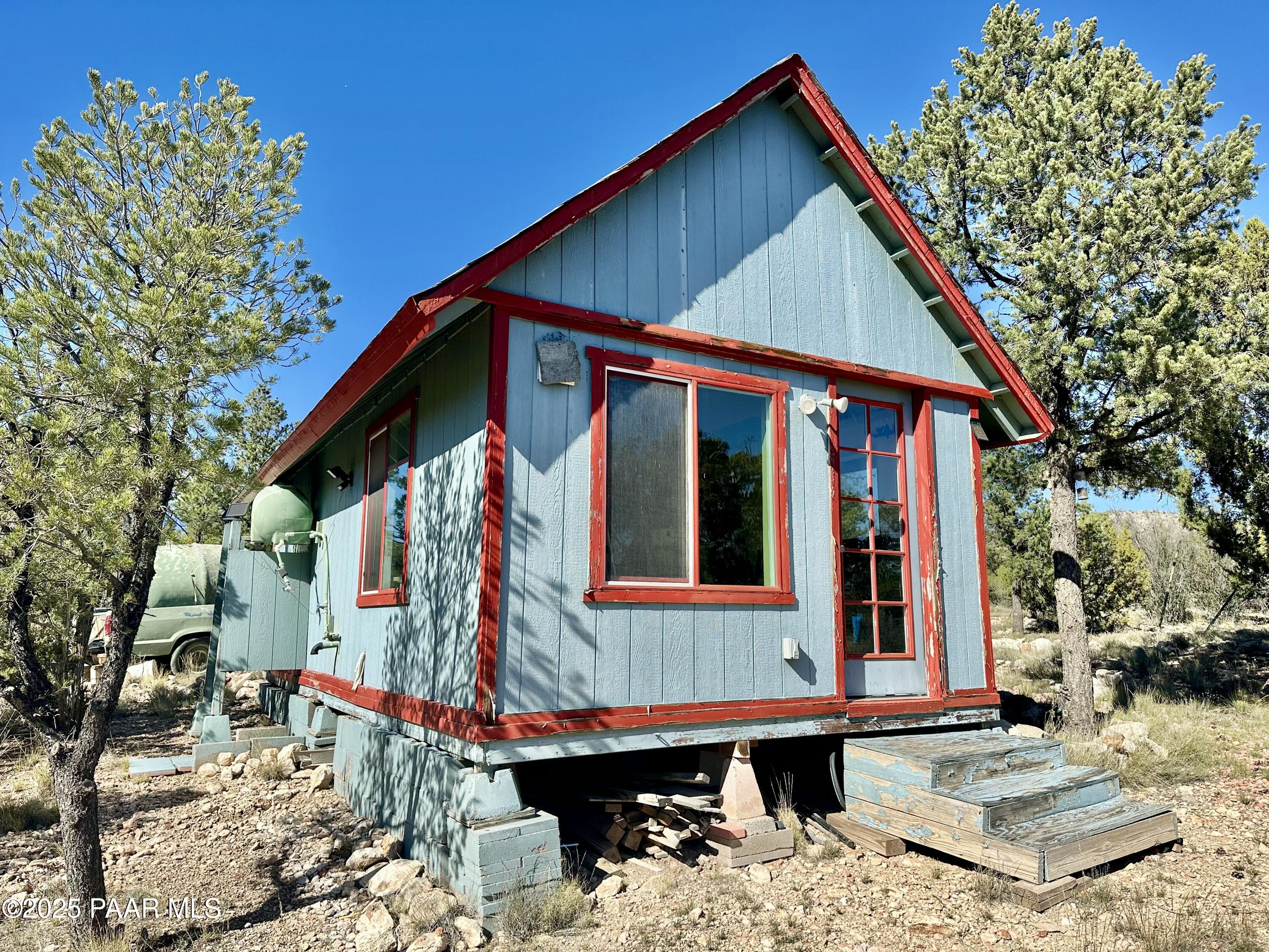 a backyard of a house with seating space